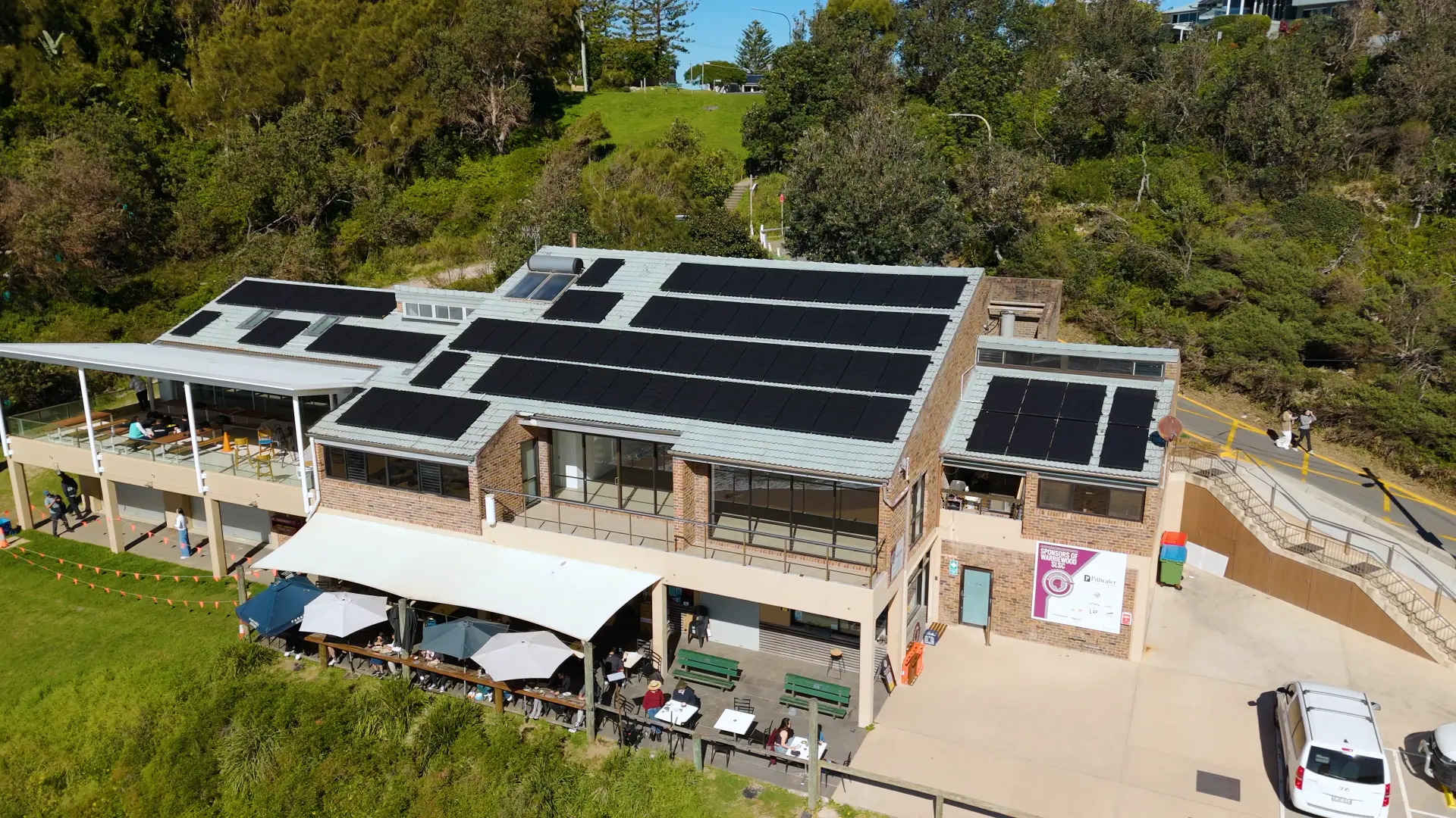 Warriewood Surf Life Saving Club with a large rooftop solar array