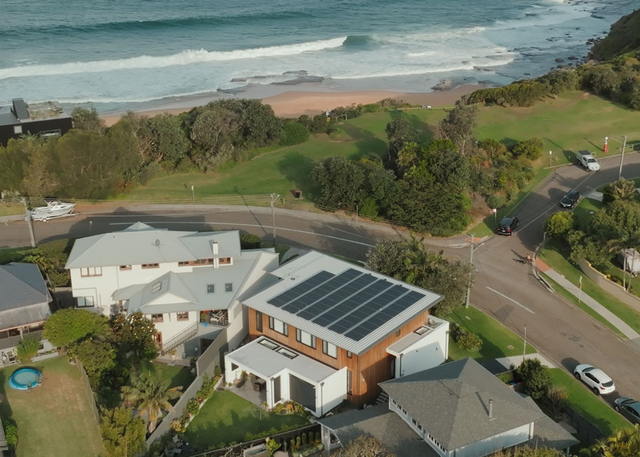 Solar panels installed on a modern coastal home
